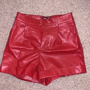 Red faux leather shorts size small. Worn once